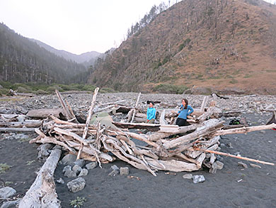 Wind protected wood-framed shelter